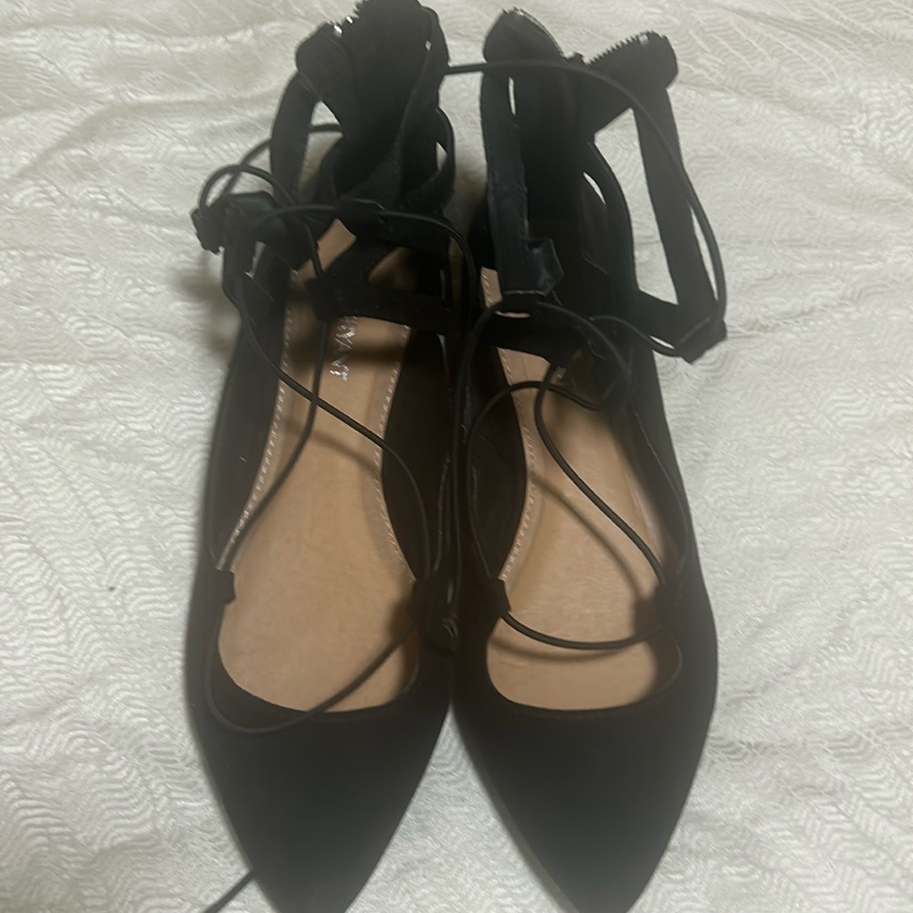 Black tie up shoes